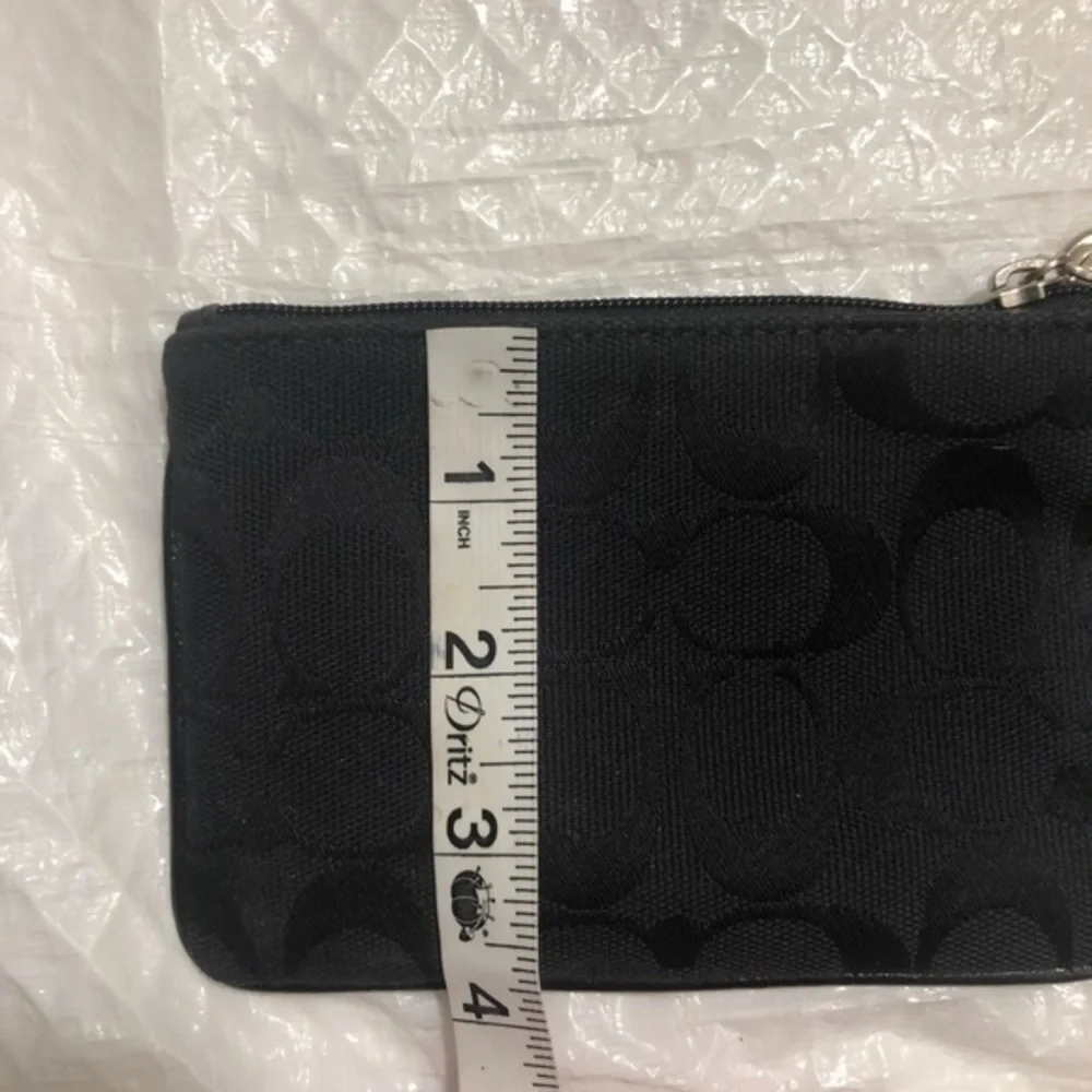Coach black signature wristlet bag